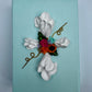 Cross with Assorted Flowers