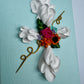 Cross with Assorted Flowers