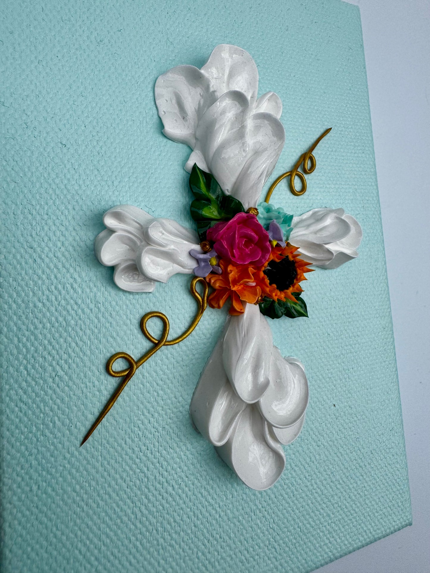 Cross with Assorted Flowers