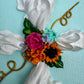 Cross with Assorted Flowers